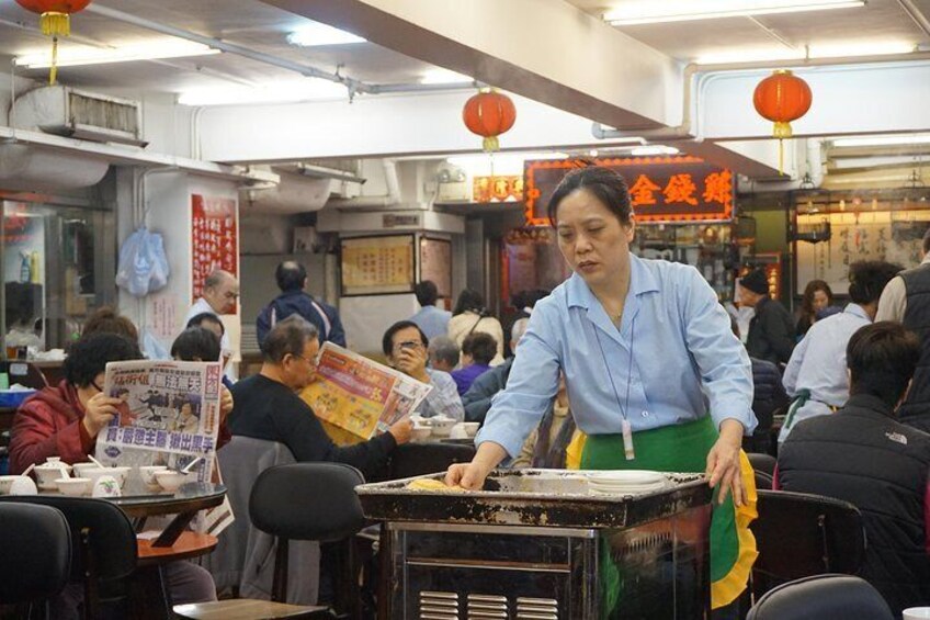Dim sum is transferred to customers using steel carts