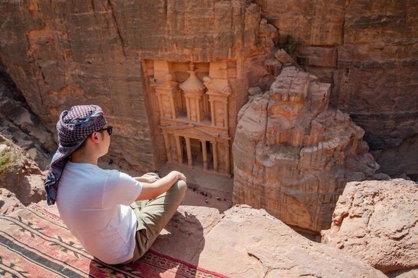 Our traveler overlooking the amazing Petra treasury. 
