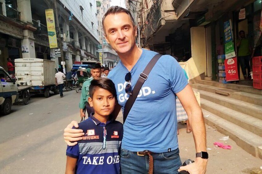 Tourist with a local street child