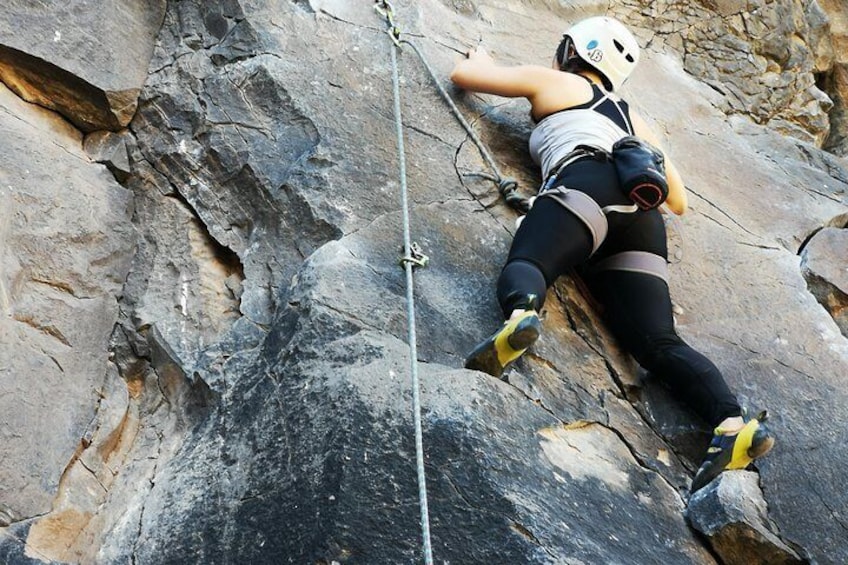 Rock climbing in natural space.