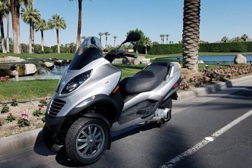Show item 2 of 15. Modern Piaggio MP3 Luxury Scooter Rentals