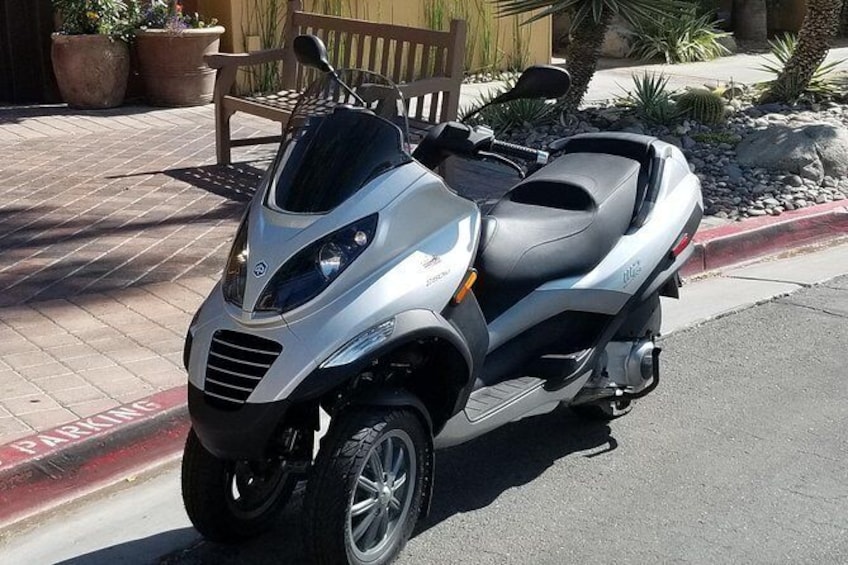 Show item 3 of 15. Modern Piaggio MP3 Luxury Scooter Rentals