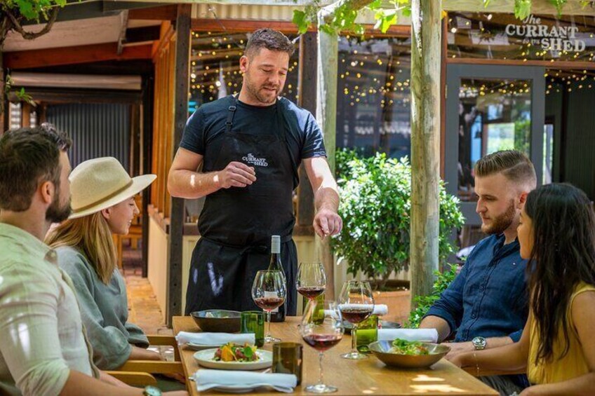 Chefs greeting guests at The Currant Shed to introduce the dishes