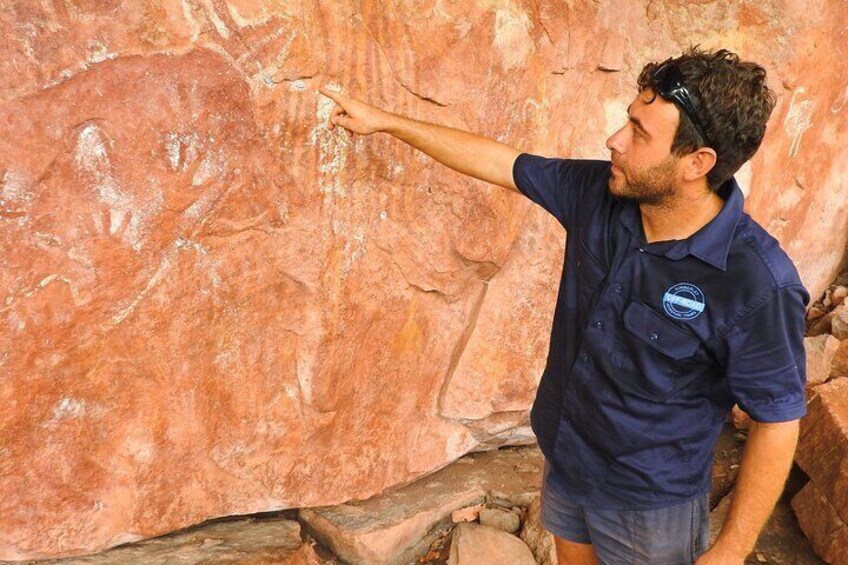 Your guide Adam Bowen explaining about the rock art