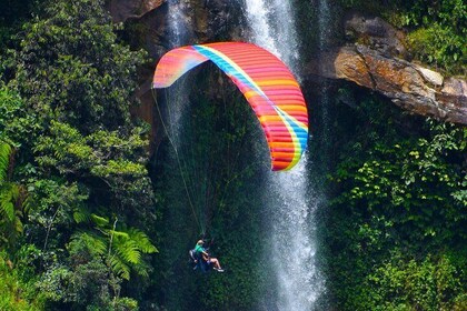 PARAGLIDING over giant waterfalls private tour (optional Guatape) from Mede...