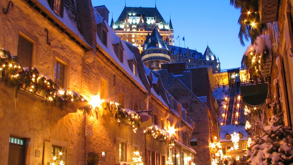 Lighted street at dusk in winter in Quebec City