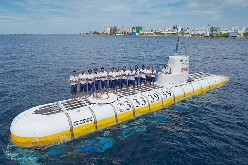 Submarine on the surface with full operational crew.