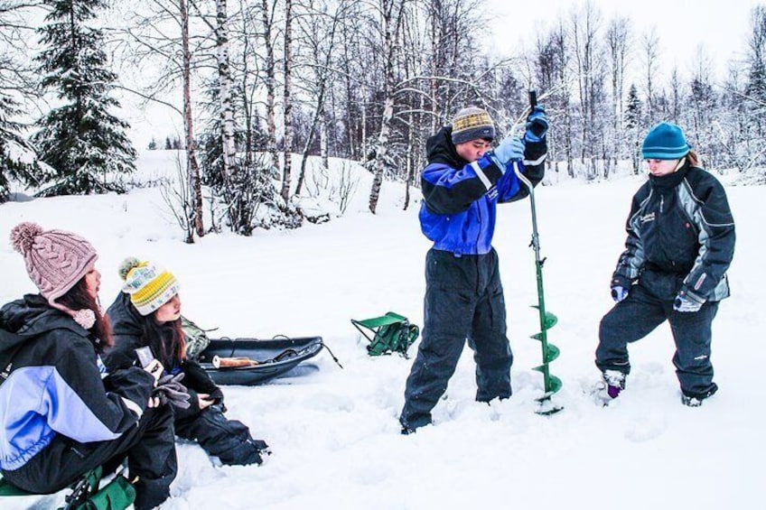 Snowshoe Trip for Ice Fishing in Ivalo