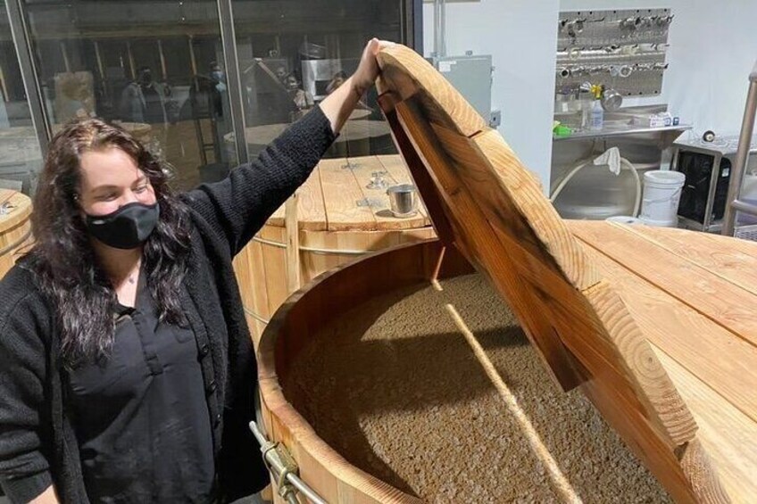 Traditional wooden fermenter with an active ferment underway. 