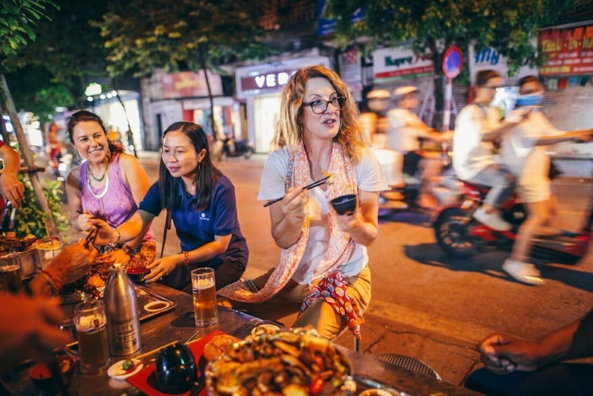 Small Group Hanoi Street Food Adventure with 5 Food Stops