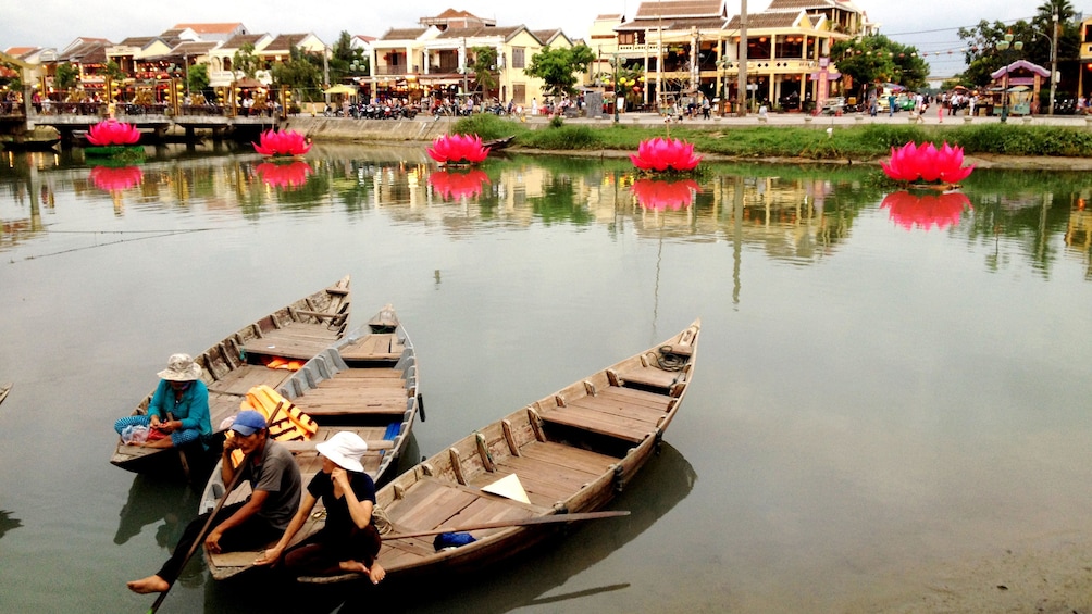 People on boats on the waters in Hoi An Vietnam
