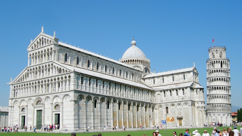 Tourists crowd around the Pisa Cathedral in Tuscany