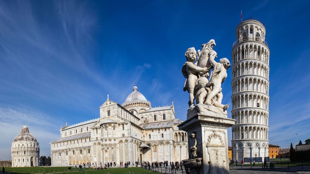 Pisa Square of Miracles with The Leaning Tower, Cathedral and Statue of Angels in Florence