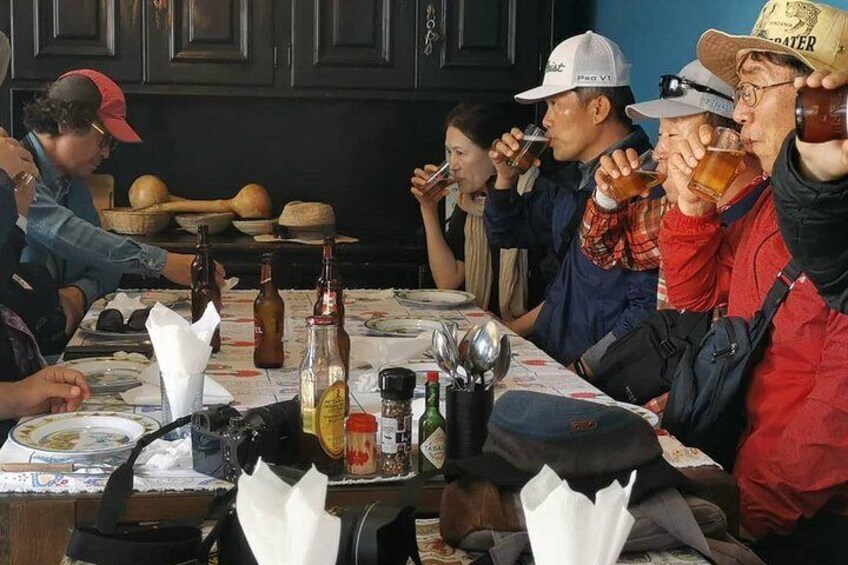 It is a highly involving tour, giving you the chance to walk the streets, hear the children at play, smell the sidewalk barbecues, taste locally brewed beer and try some of the local food like the mop