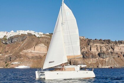 Santorini Gold Catamaran Cruise with BBQ, Drinks and Hotel Pickup