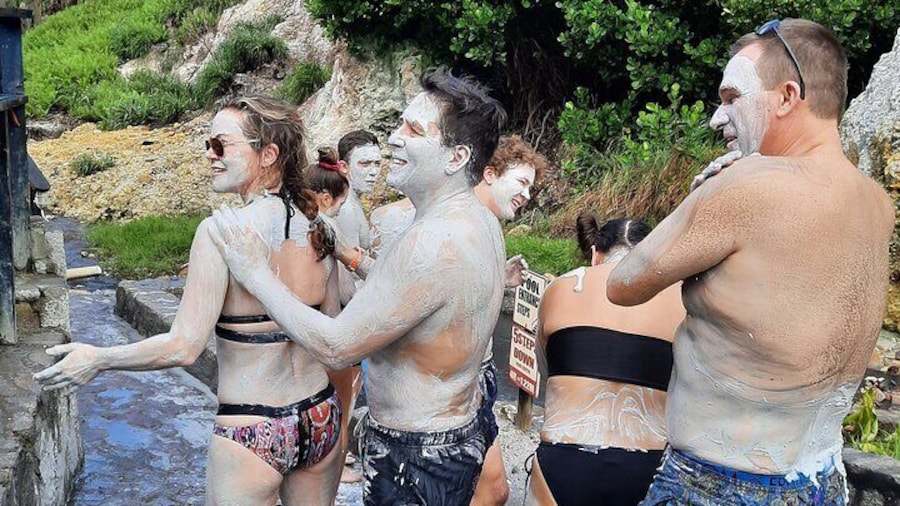 Applying white mud at volcano mud bath