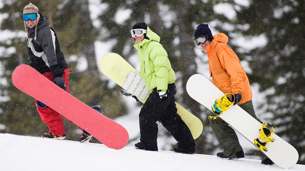 Three snowboarders in Brighton