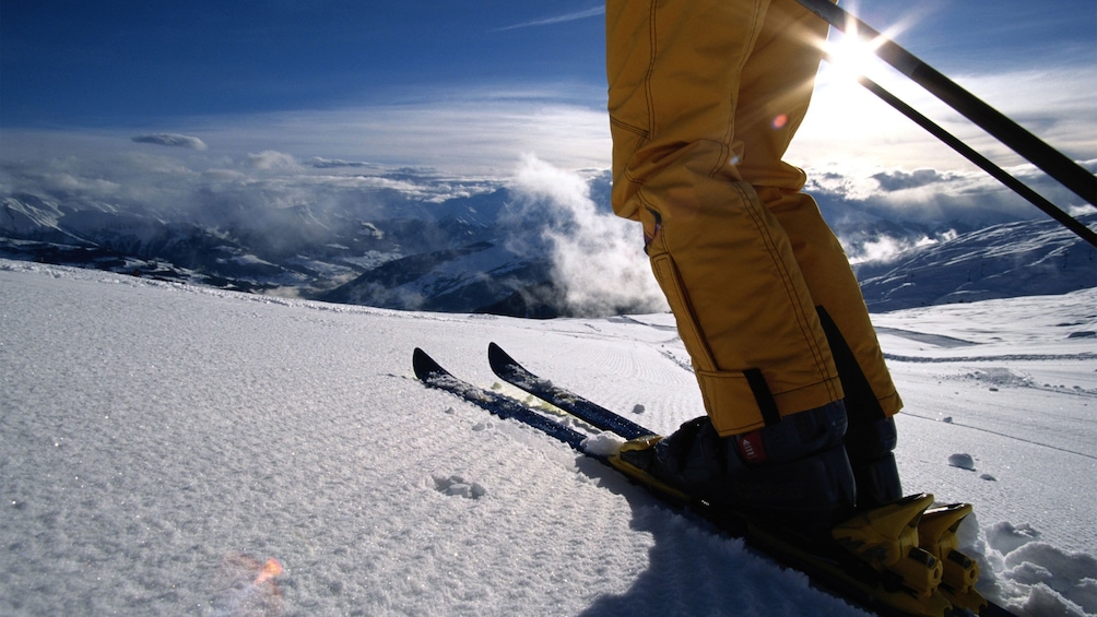 Artistic shot of a skier preparing to traverse the slopes