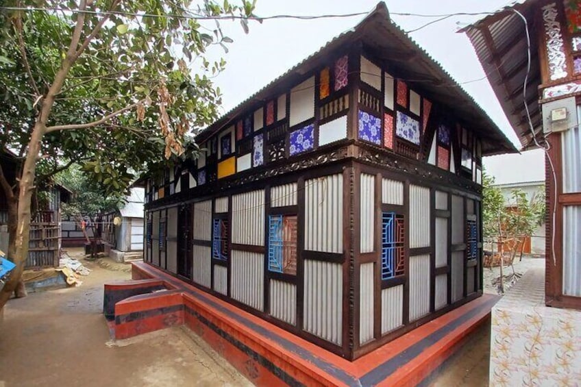 Traditional Village House at a River Island