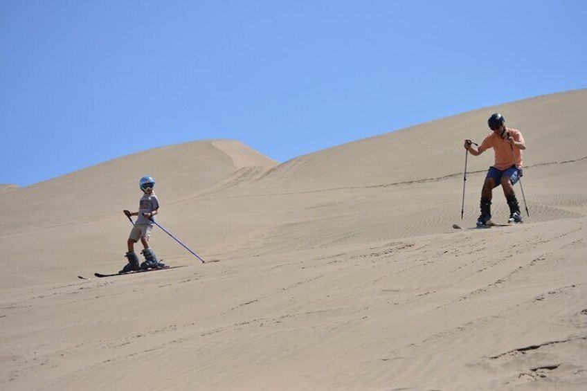 Ski the dunes of Lima, choose the afternoon tour for the best pictures and best sand conditions.