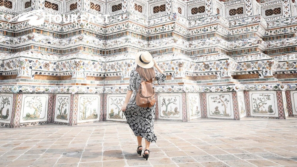 Woman on grounds of Wat Arun Temple