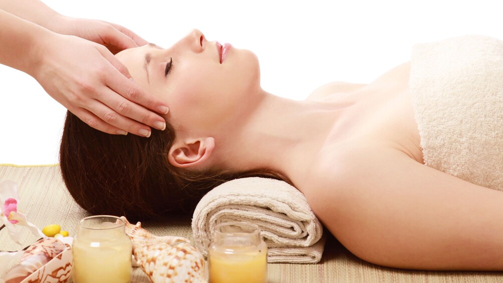Woman having her temples massaged at the spa in Nha Trang
