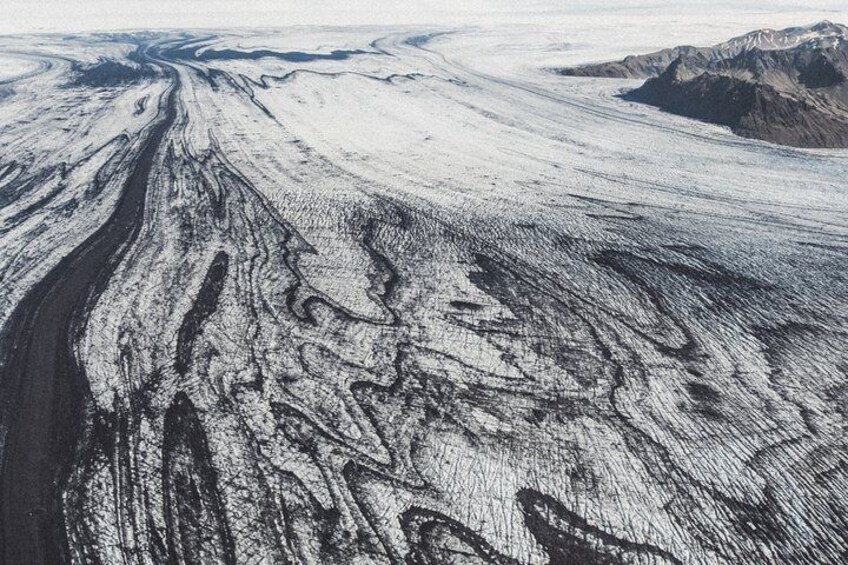 Sightseeing flight over black sands and riverbeds from Skaftafell Terminal