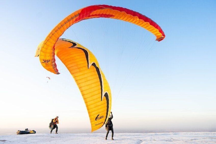 Paragliding in Marrakech Agafay Desert Sunset.