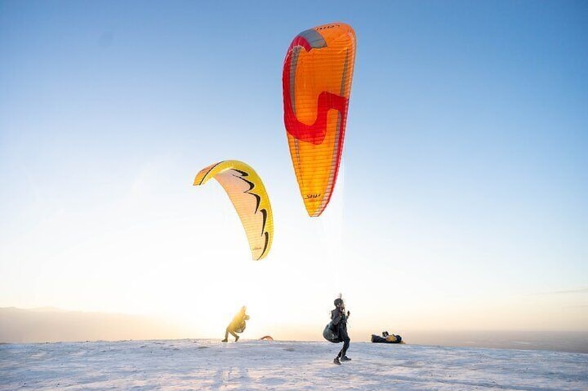 Paragliding in Marrakech Agafay Desert Sunset.
