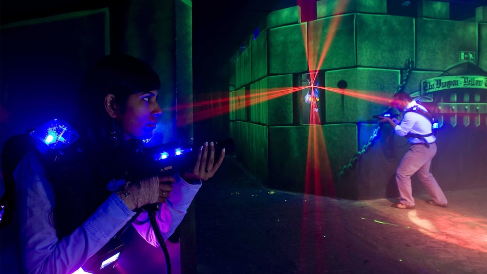 man and woman playings laser tag in Abu Dhabi