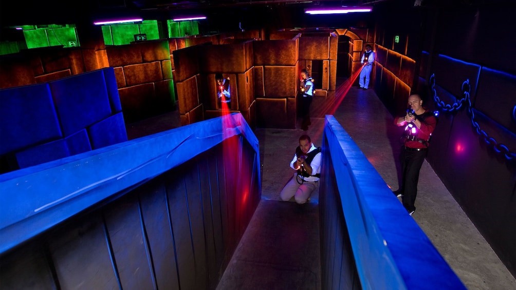 five people playing laser tag in Abu Dhabi