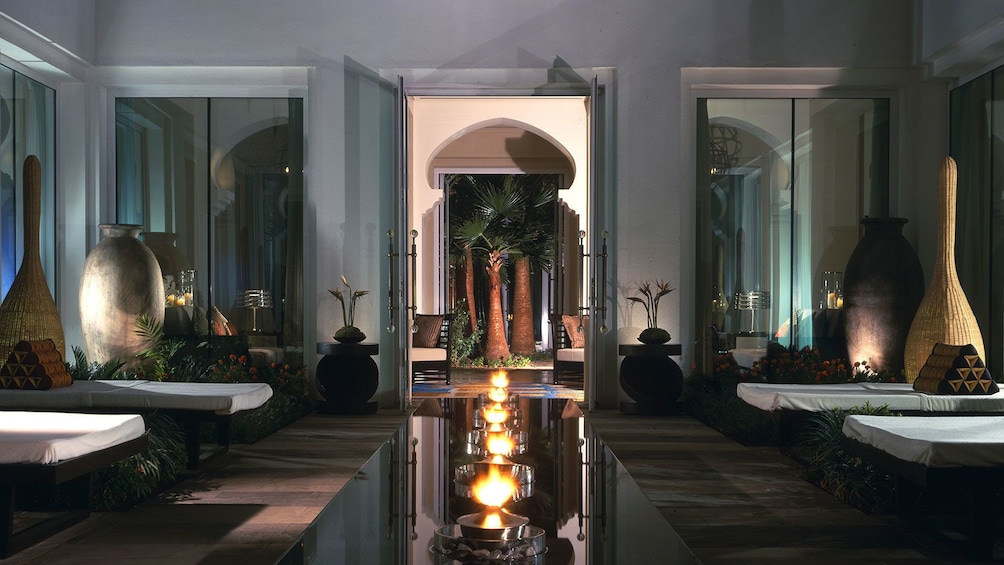 Show item 3 of 5. candles on table and lounge chairs at Amara Spa in Abu Dhabi