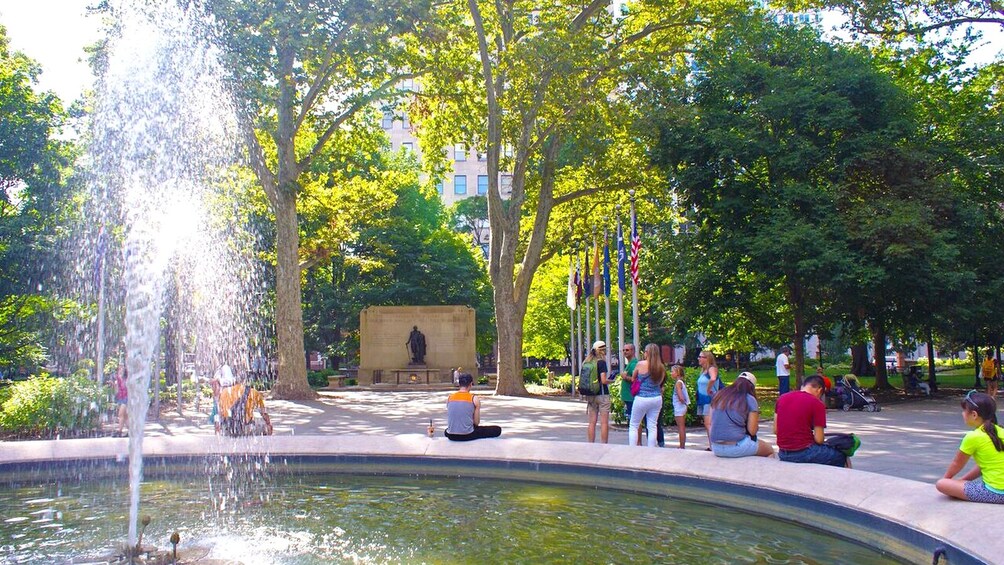 Tour group next to a fountain in Philadelphia 
