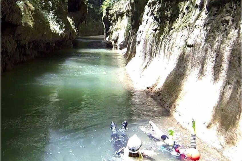 Float downstream among the towering canyons fed by underground springs.