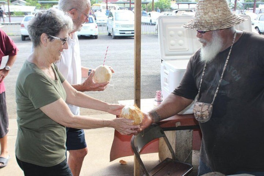 Explore the markets and enjoy an ice cold Niu (Coconut) on us