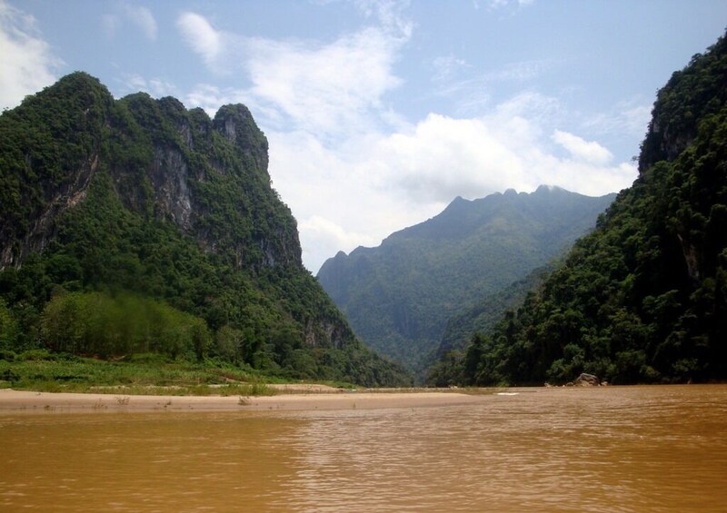 Private Full-Day City, Village & Pak Ou Caves Excursion 
