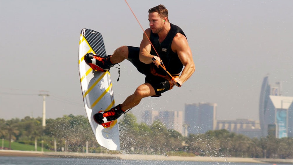 Wakeboarder jumping from water in Dubai