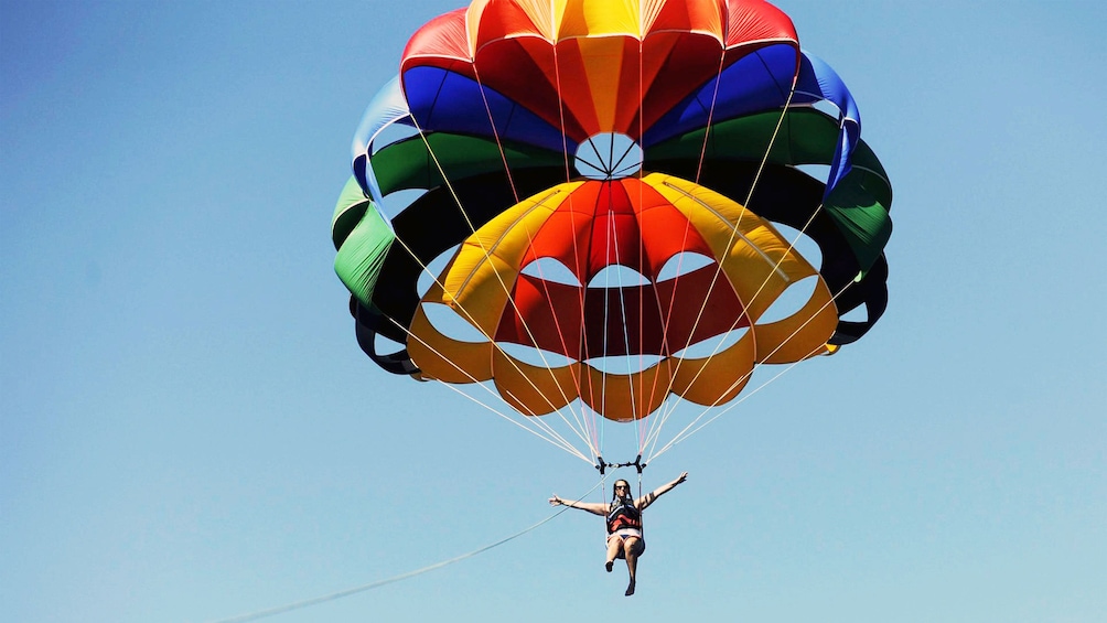 Colorful parachute and parasailers in Dubai