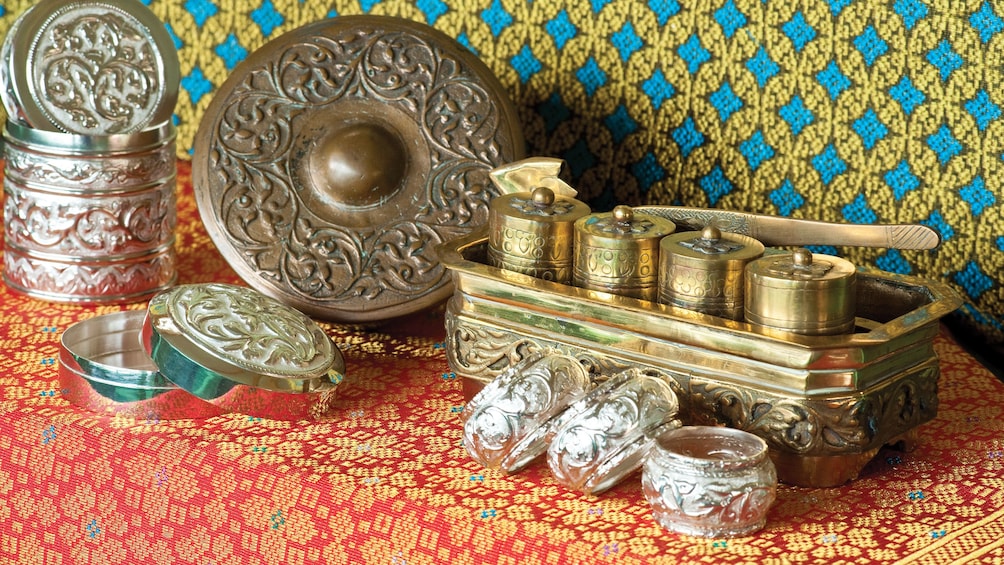 Show item 4 of 5. Artifacts on display at the Royal Regalia Center