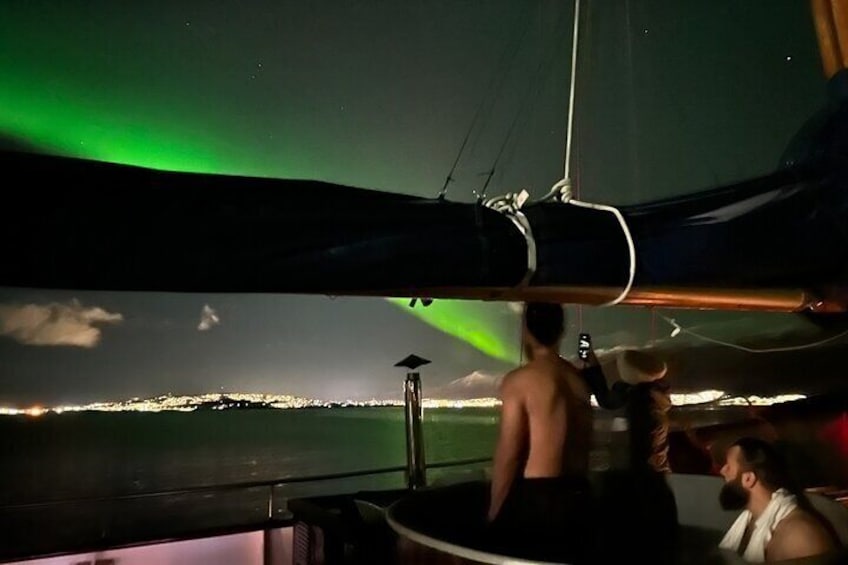 See the aurora borealis from the warmth of the hot tub