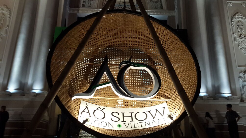 Show item 4 of 9. Sign outside the A O Show Saigon in Ho Chi Minh City