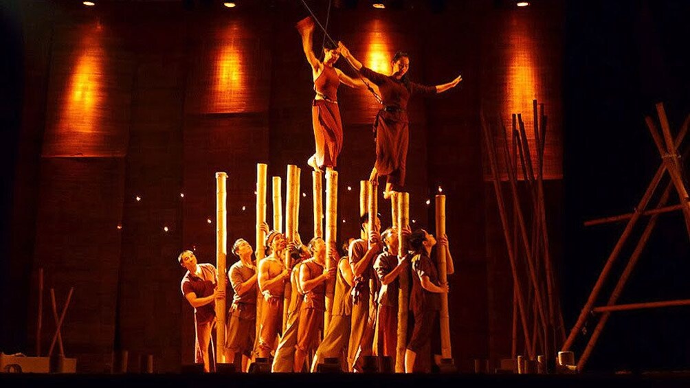 Performers on stage during the A O Show Saigon in Ho Chi Minh City