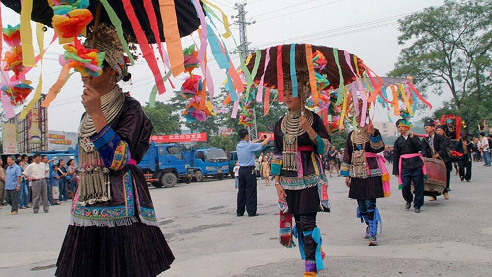 indigenous locals participating in the parade in Guilin