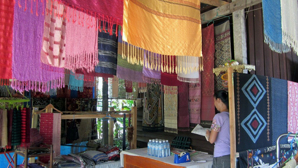 Colorful silk scarves for sale at a village in Laos