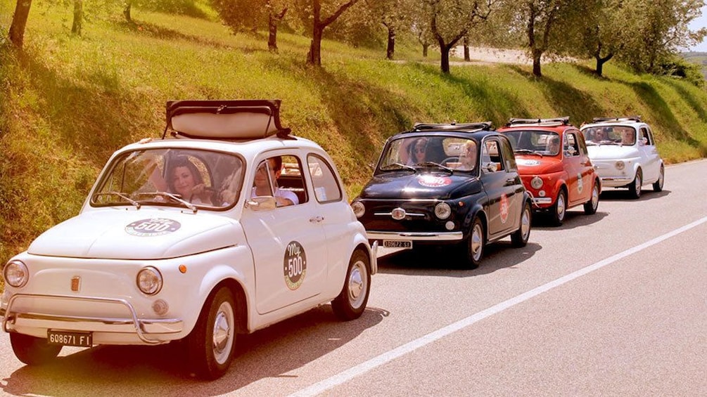 Multicolored Fiats on Fiat 500 Vintage Tour in Tuscany Italy