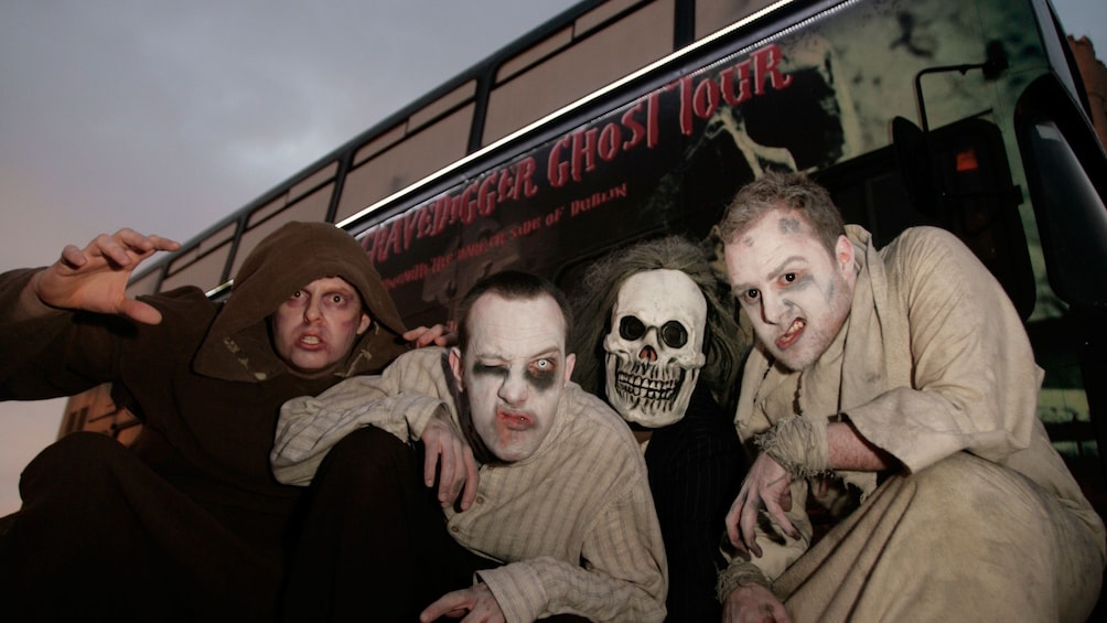 men dressed as ghouls on a tour bus in Dublin