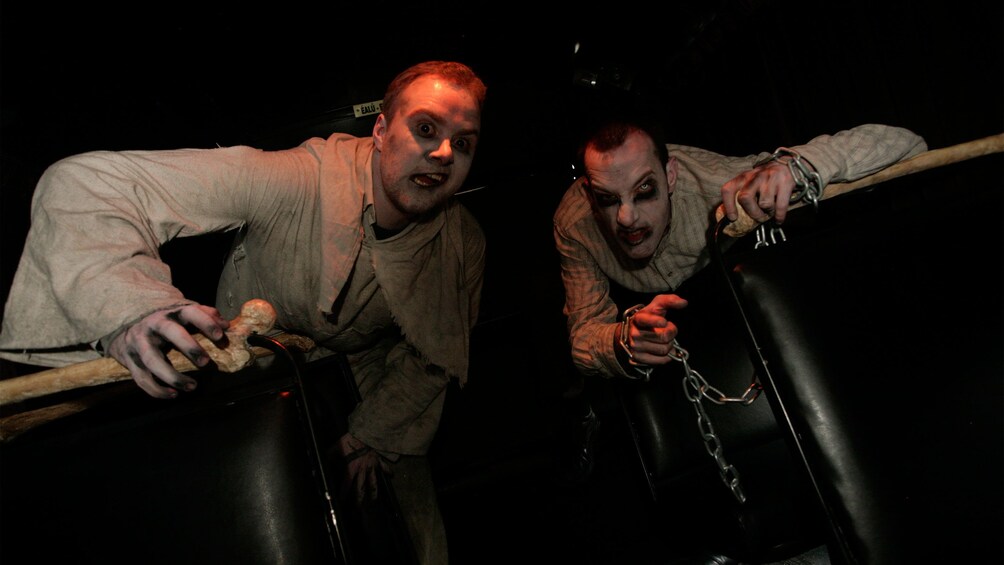 Two men on the Gravedigger Ghost Bus Tour