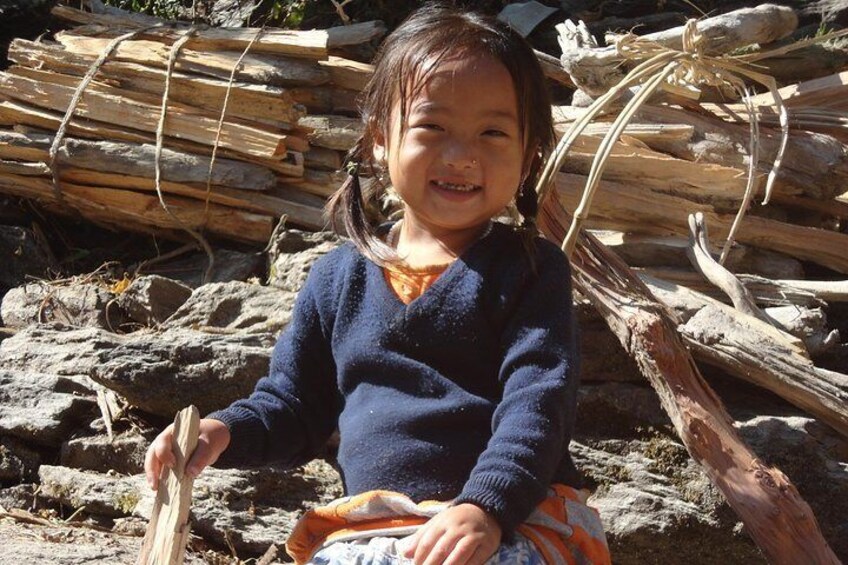School kid smiling on Jagat at Annapurna Circuit Trek