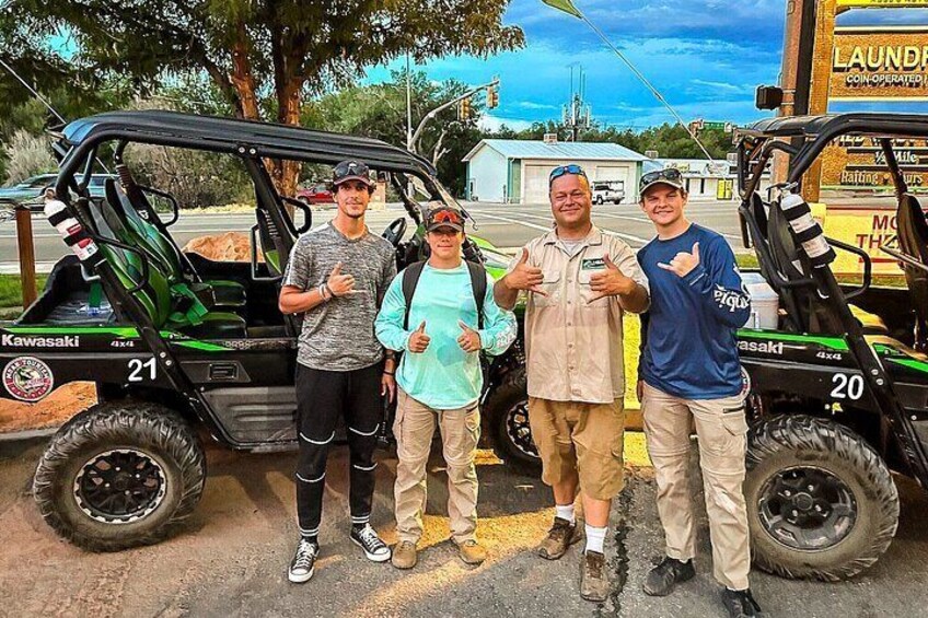 Our guide Jesse and his happy guests at the Moab Tourism Center.