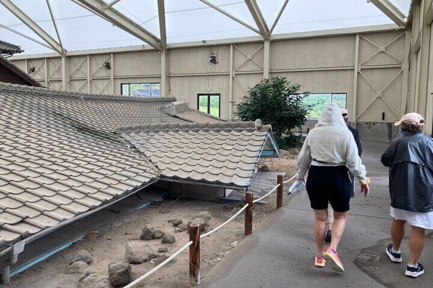 Exploring the volcano destroyed houses in Nagasaki.